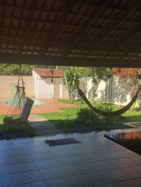 Quarto em Guarapari a 5 min da praia de Peracanga e Bacutia - Litoral Sul